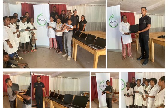 ERA international donation recipients with laptops